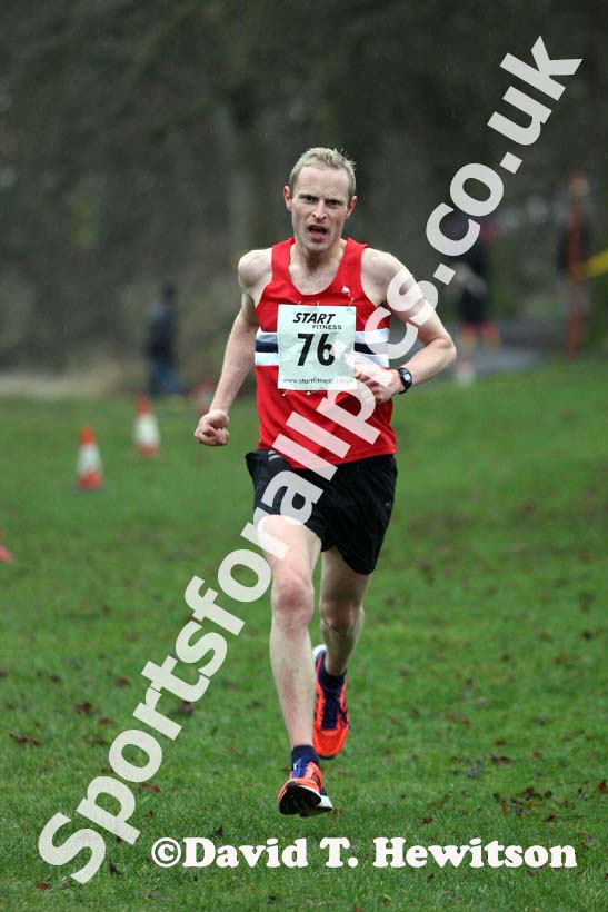 Graham Cook (NSP) finishing the New Years Day Morpeth 11k Road Race. Photo: David T. Hewitson/Sports for All Pics